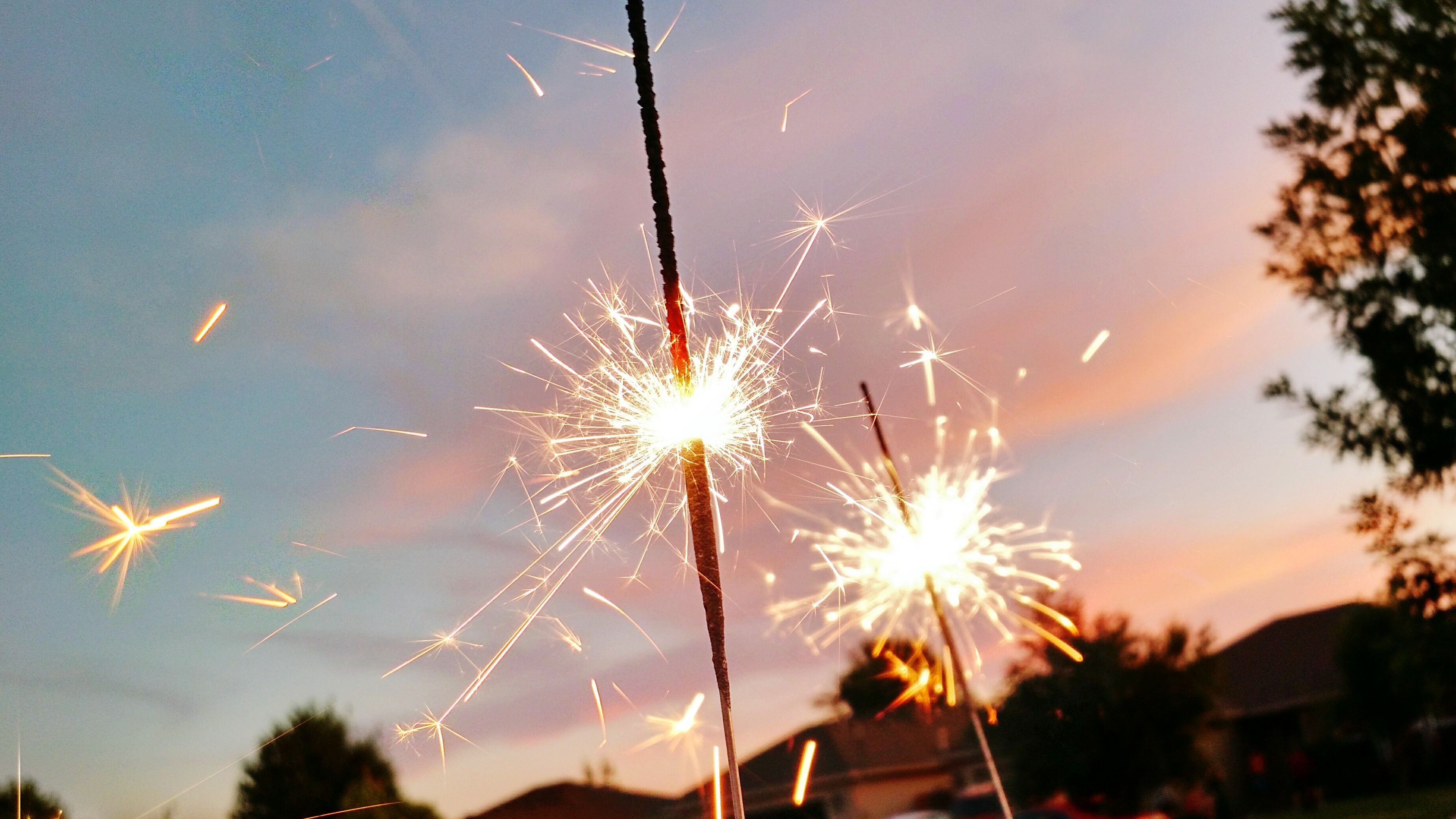 close-up-of-sparkler-against-sky-during-sunset-royalty-free-image-593436249-1559756983